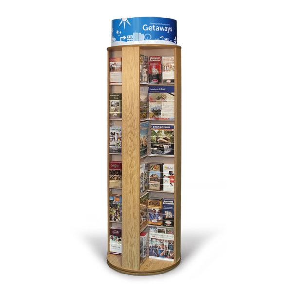an oak floor standing spinning literature rack full of magazines and brochures