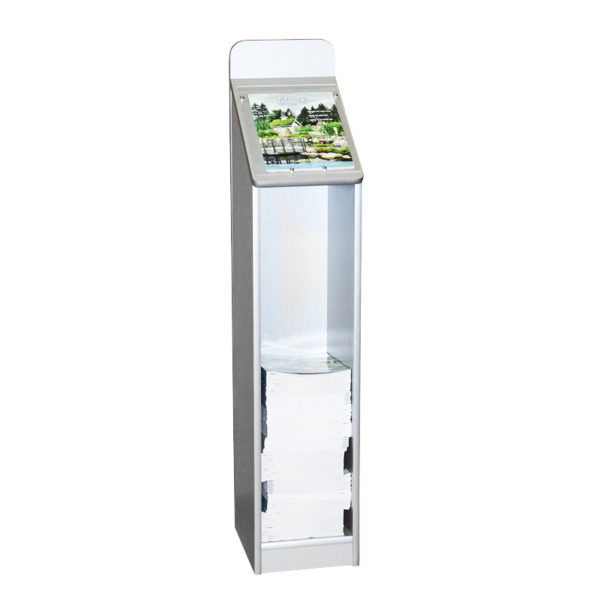 a floor standing silver wooden magazine rack that is partially filled