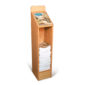 oak floor standing wood magazine rack for restaurants, partially filled with magazines