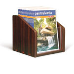 small mahogany wooden magazine holder for countertops, filled with magazines