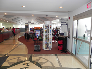 a large rotating literature display in the front area of a large open office building